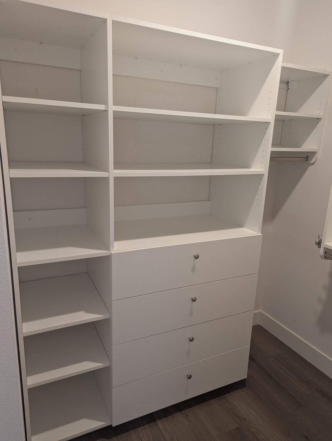 White 7 by 7 closet, left wall, with drawers and shelves