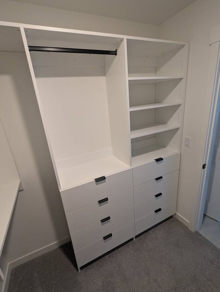 White closet, right wall, with a four-drawer stack